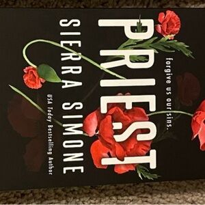 'Priest' Book with Red Accents